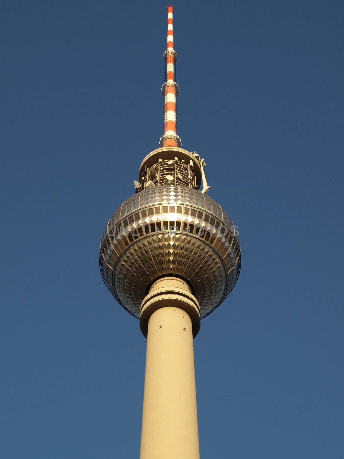 Berlin Fernsehturm television tower over blue sky