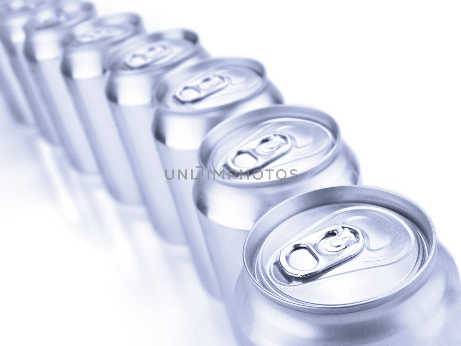 Close up view of a row of tin cans. Shallow depth of field.