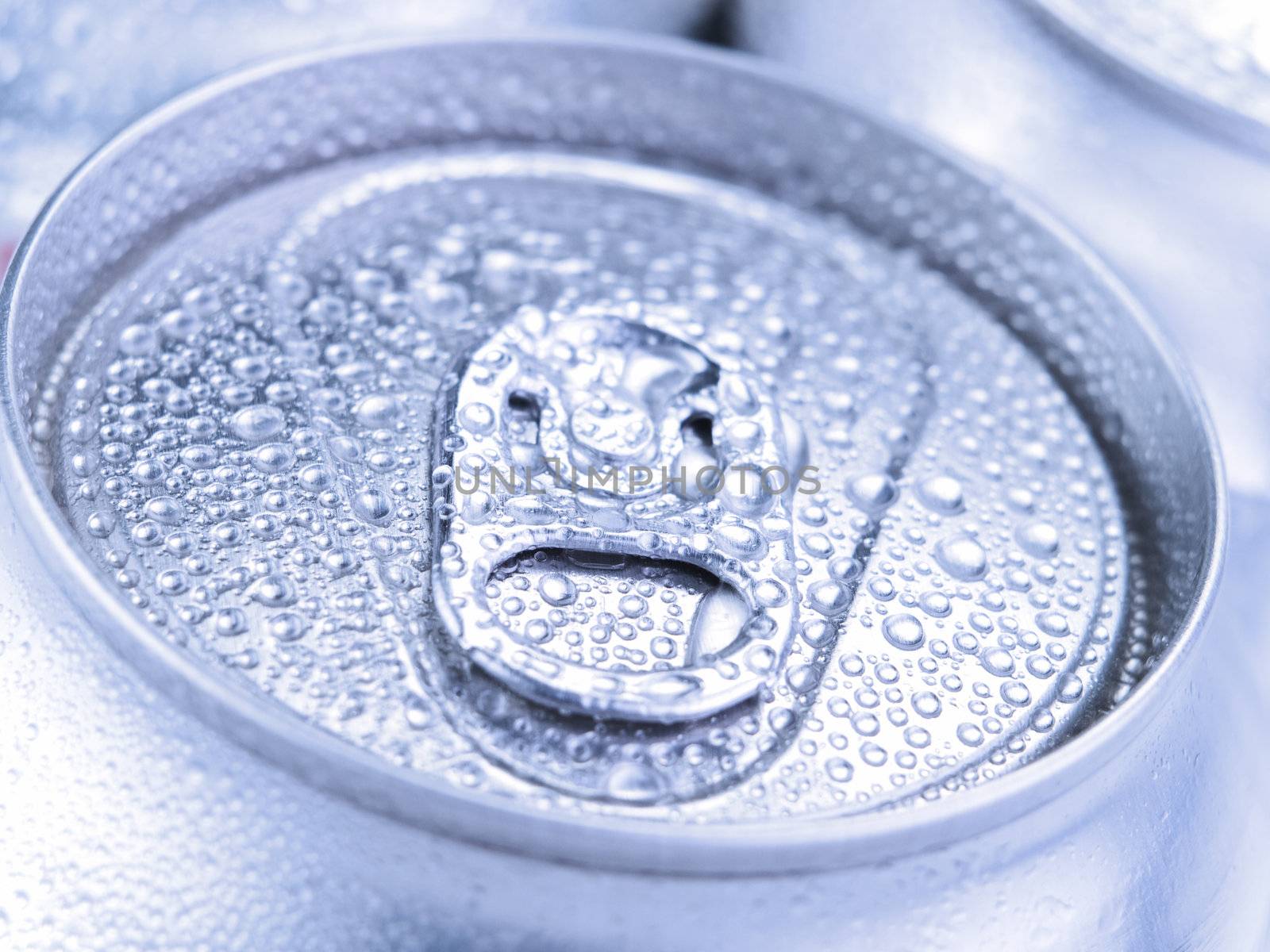 Close up view of a tin can with condensation.