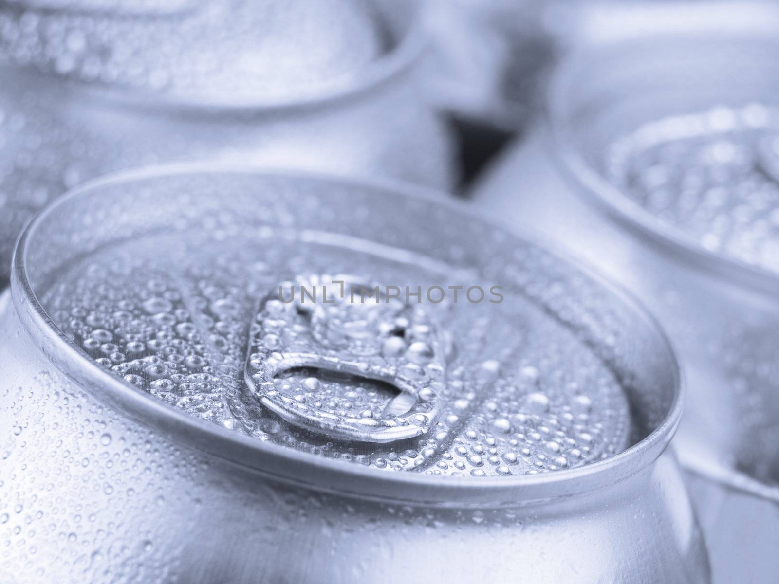 Close up view of a tin can with condensation.