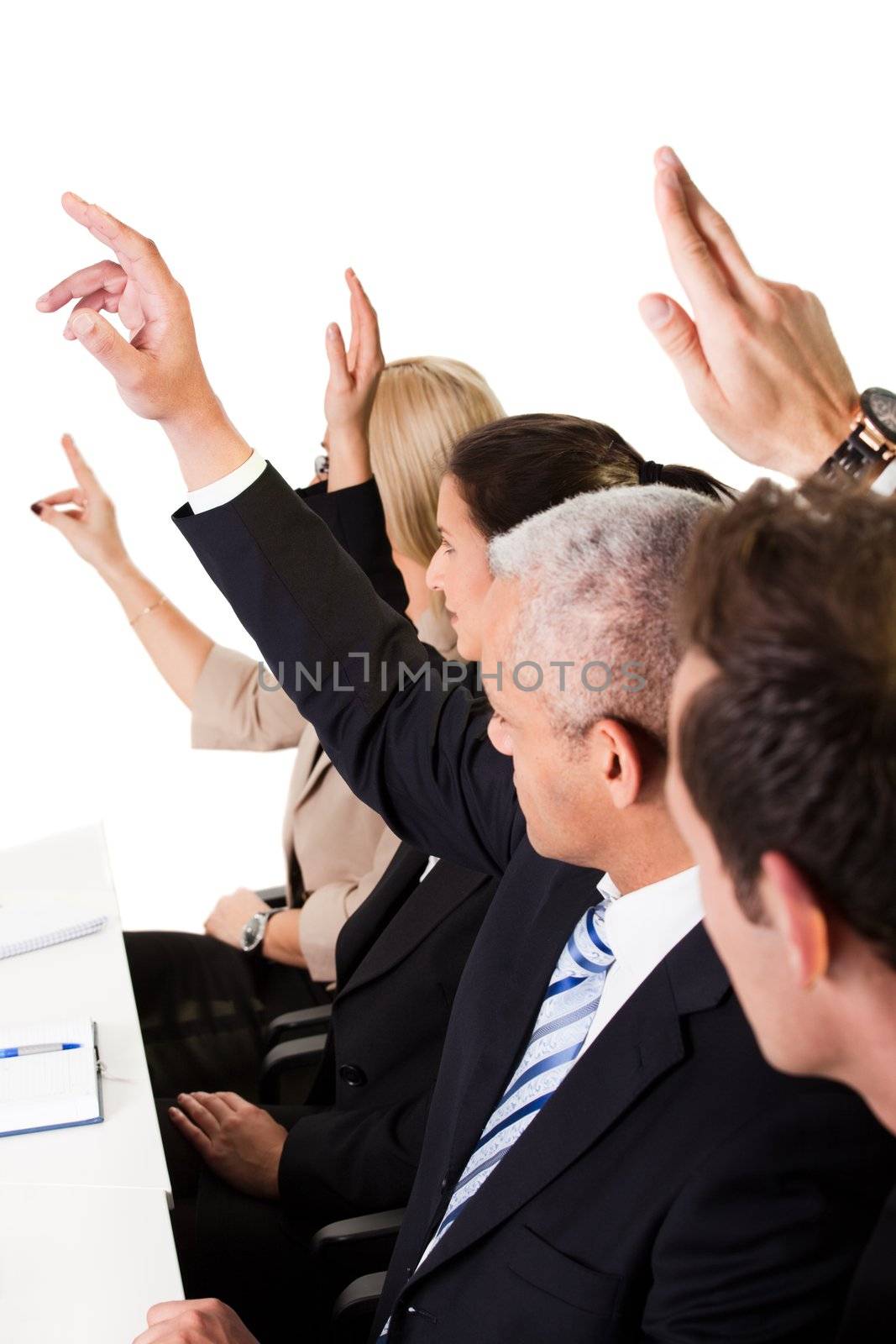 Business lecture with hands raised in the air