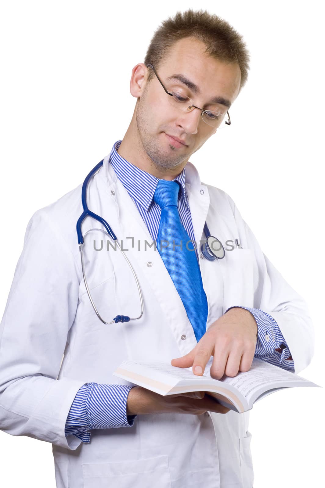 portrait of a male caucasian doctor reading medical book