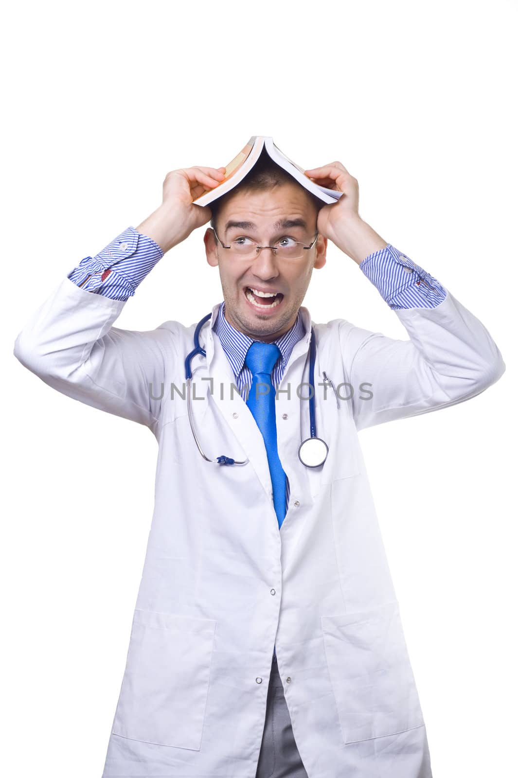 funny young doctor balancing book on his head