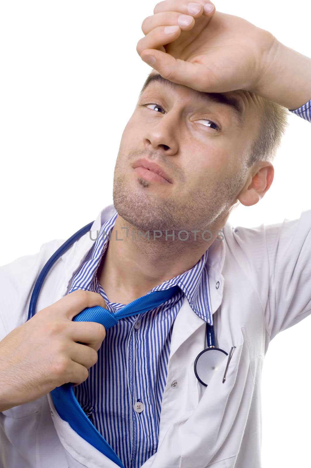 portrait of an overworked young male doctor