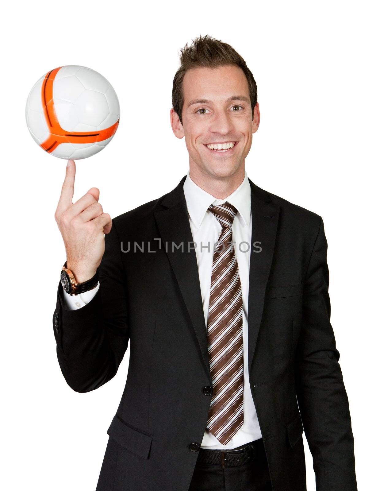 Businessman spinning soccer ball on the finger. Isolated on white