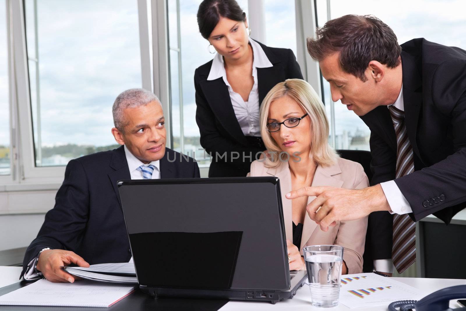 Business team at the meeting discussing work