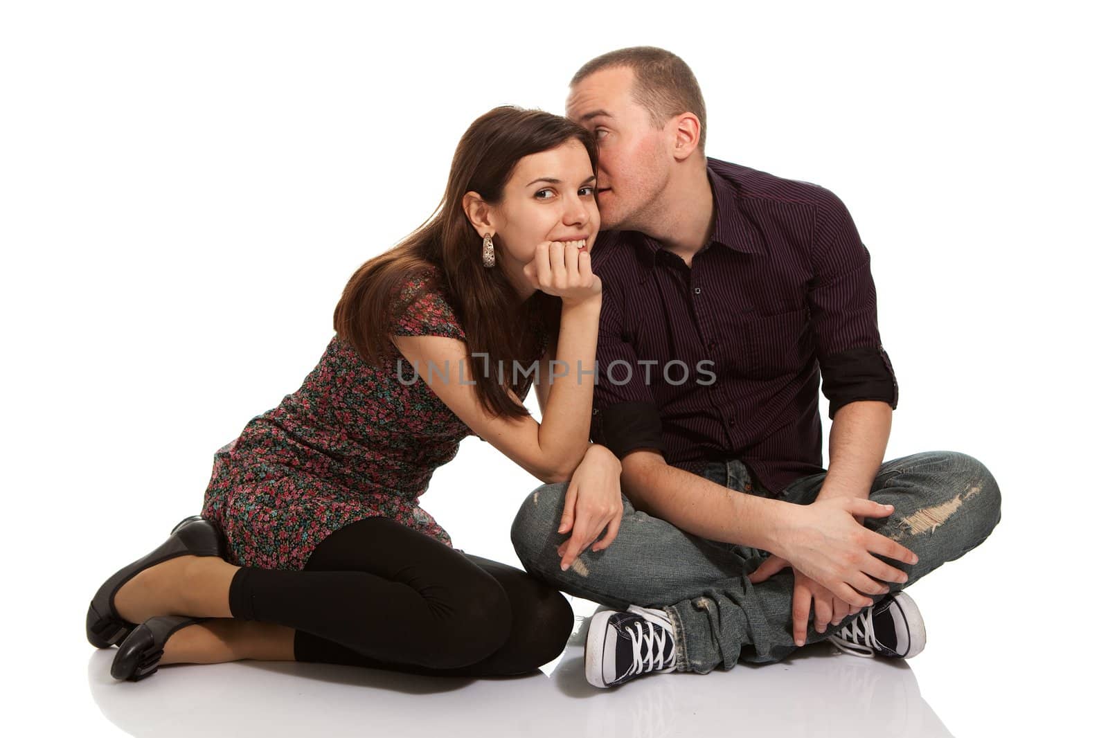 Men and woman talking rumors. Isolated on white