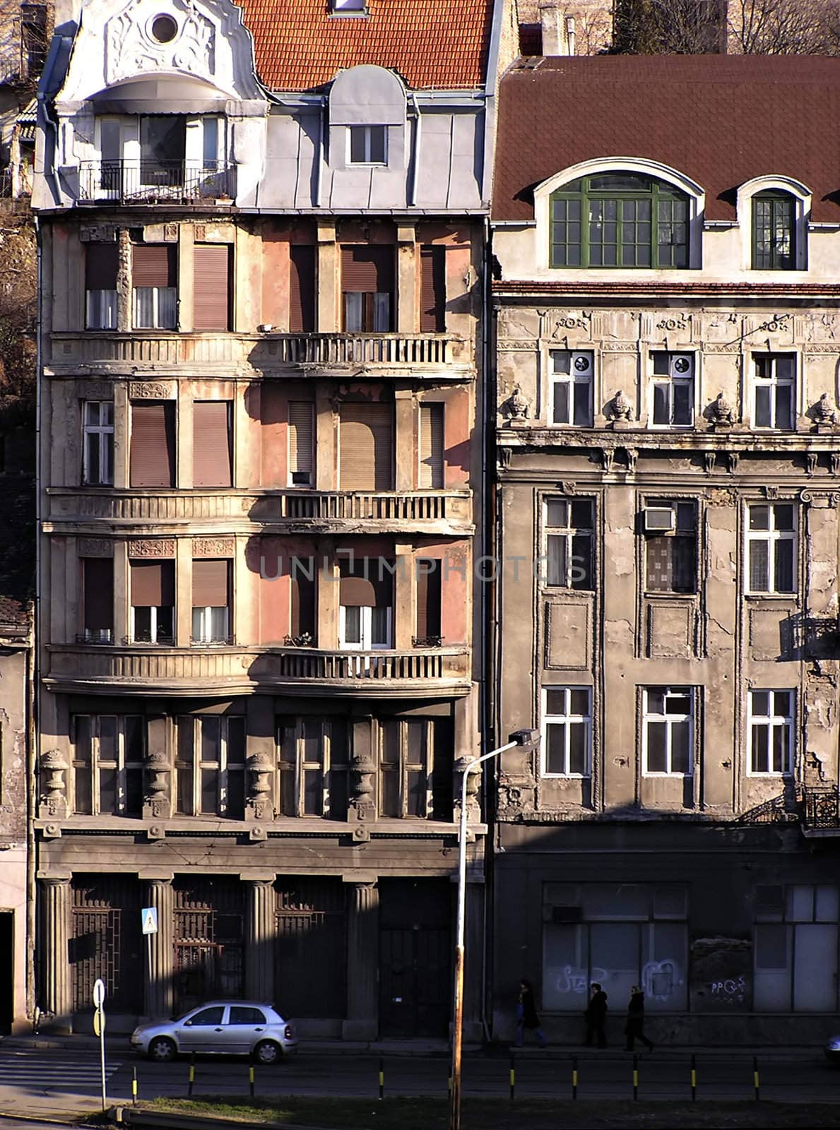 Detail of old part of Belgrade city, old building with ruined facade.