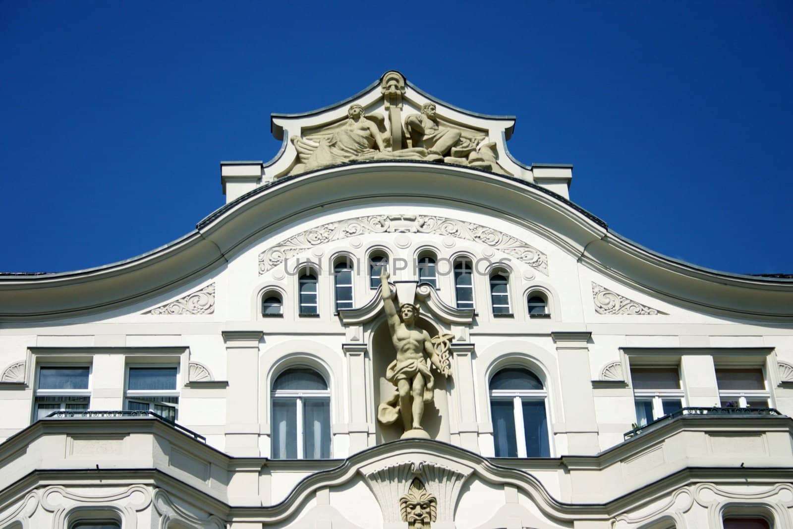 The old white house, architectural moulding of a facade outside