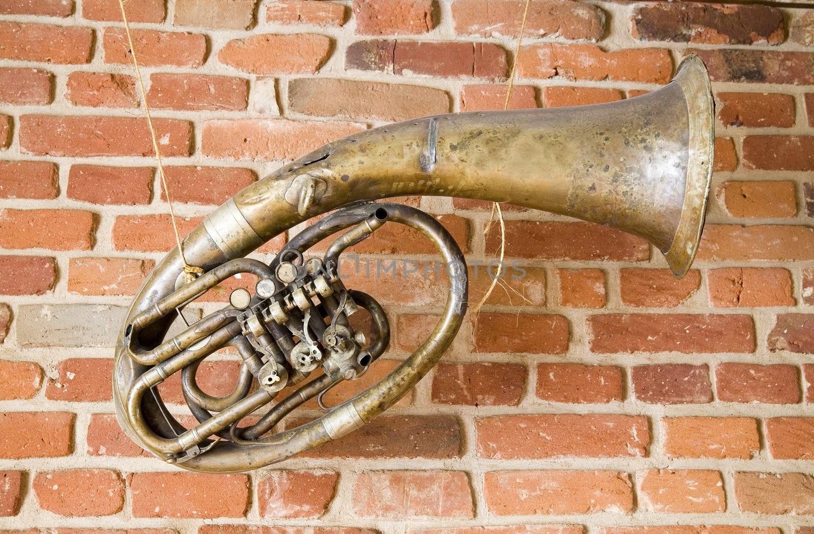 old music instrument on the brick wall