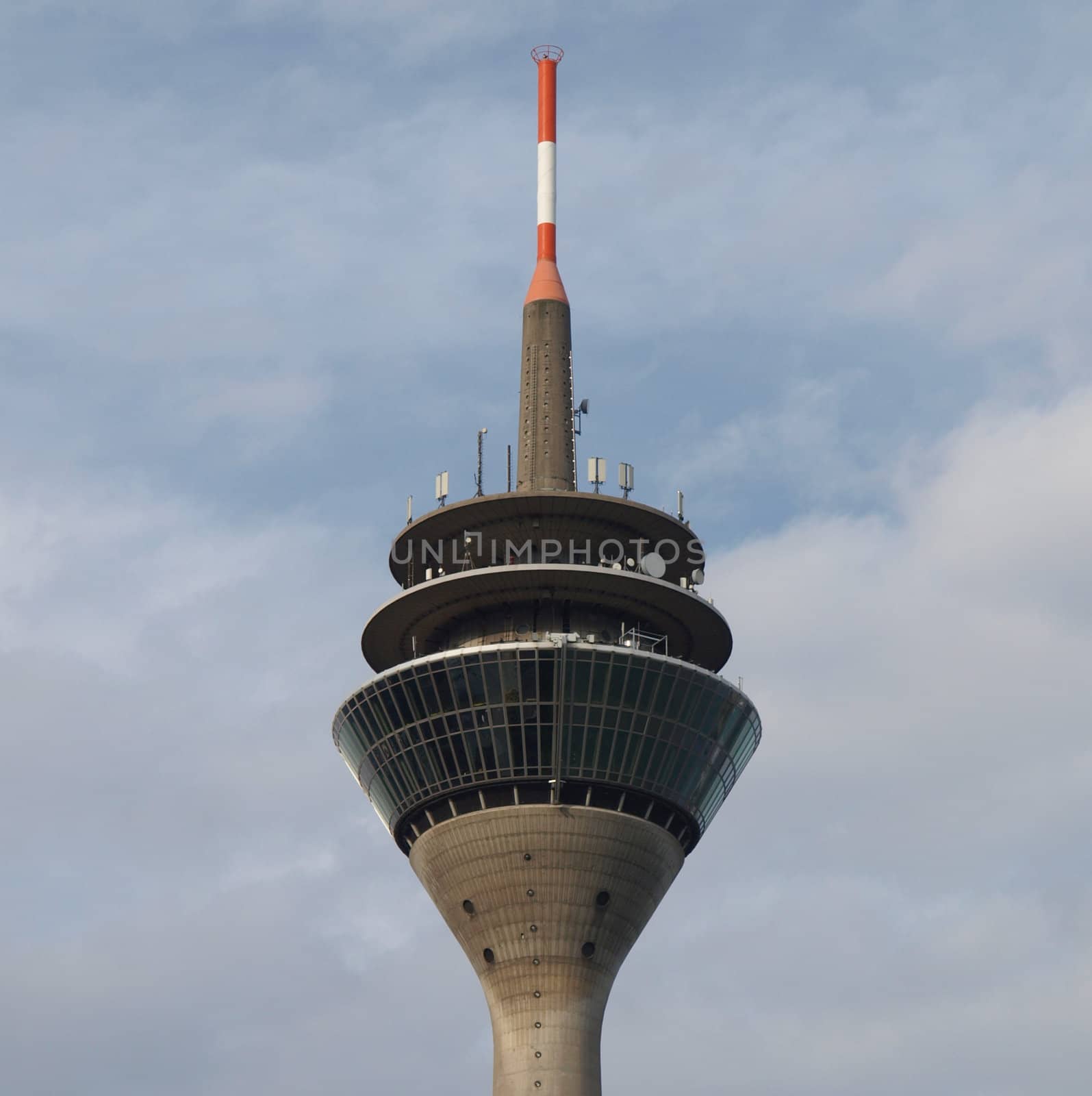 Duesseldorf Rheinturm telecommunications tower over blue sky