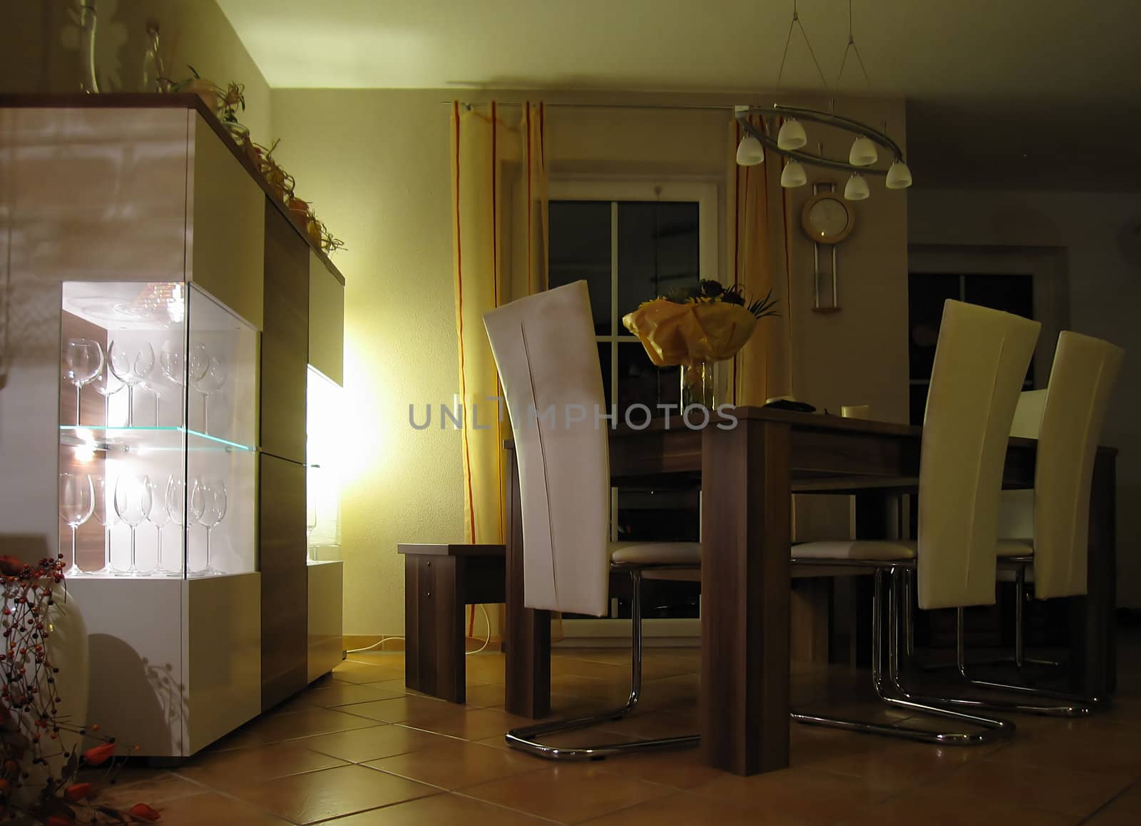 Living room with lighted furniture at night