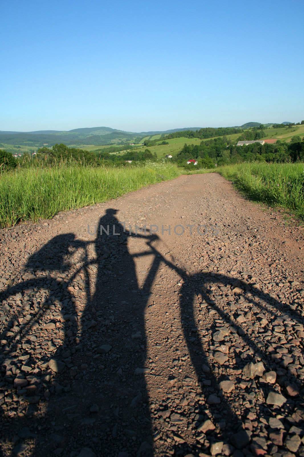 bicyclist's shadow by furzyk73