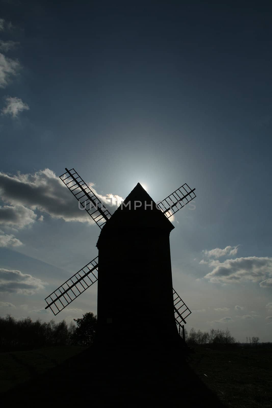 windmill during the sunset by furzyk73