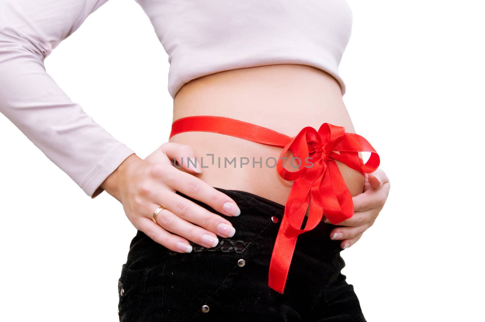 Pregnant woman's belly with red ribbon around by Angel_a