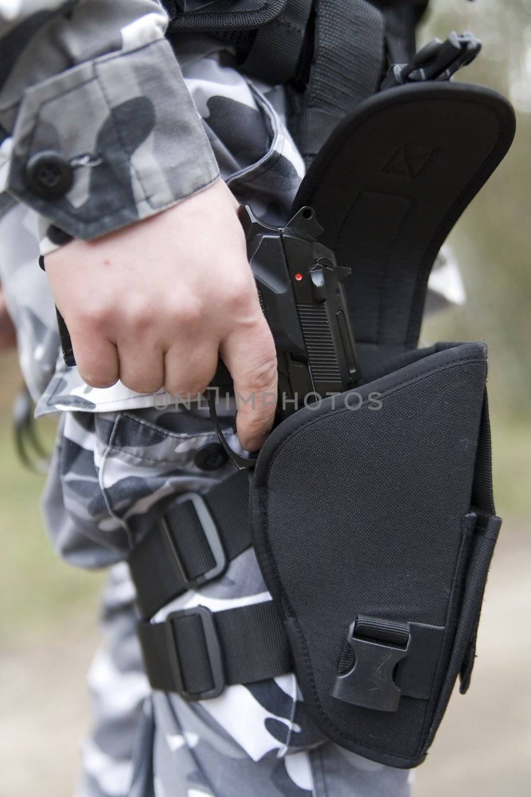 gun holster with a 9mm weapon inside
