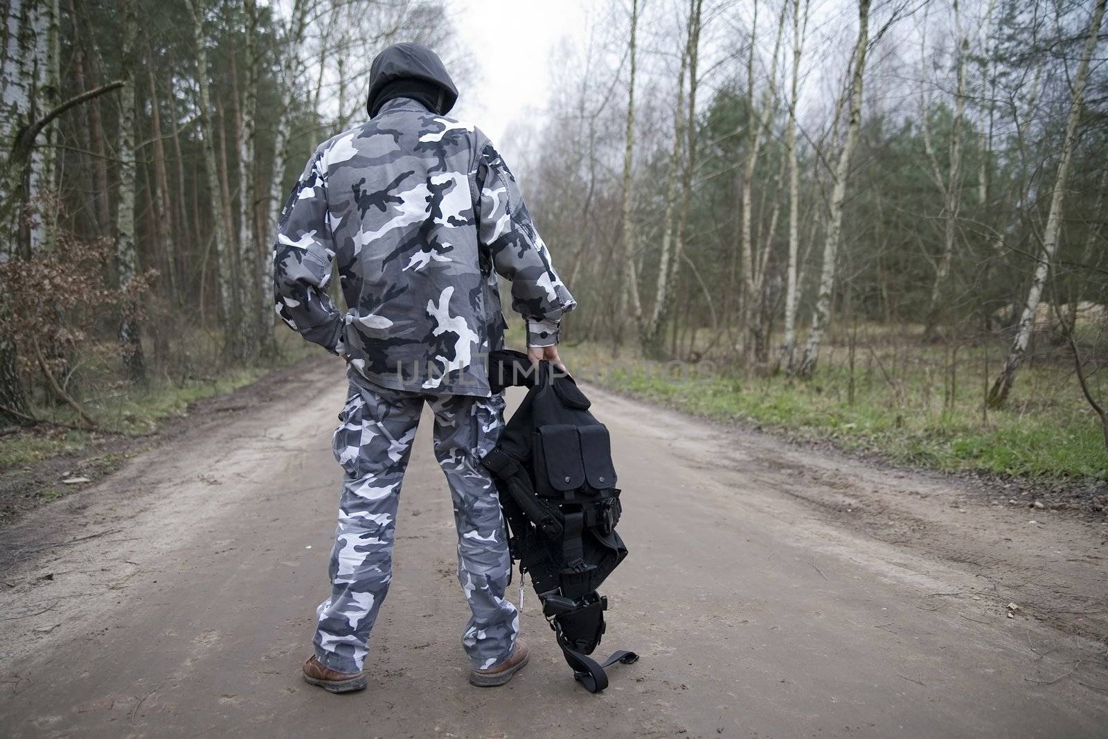 a lonely S.W.A.T ranger in the forest