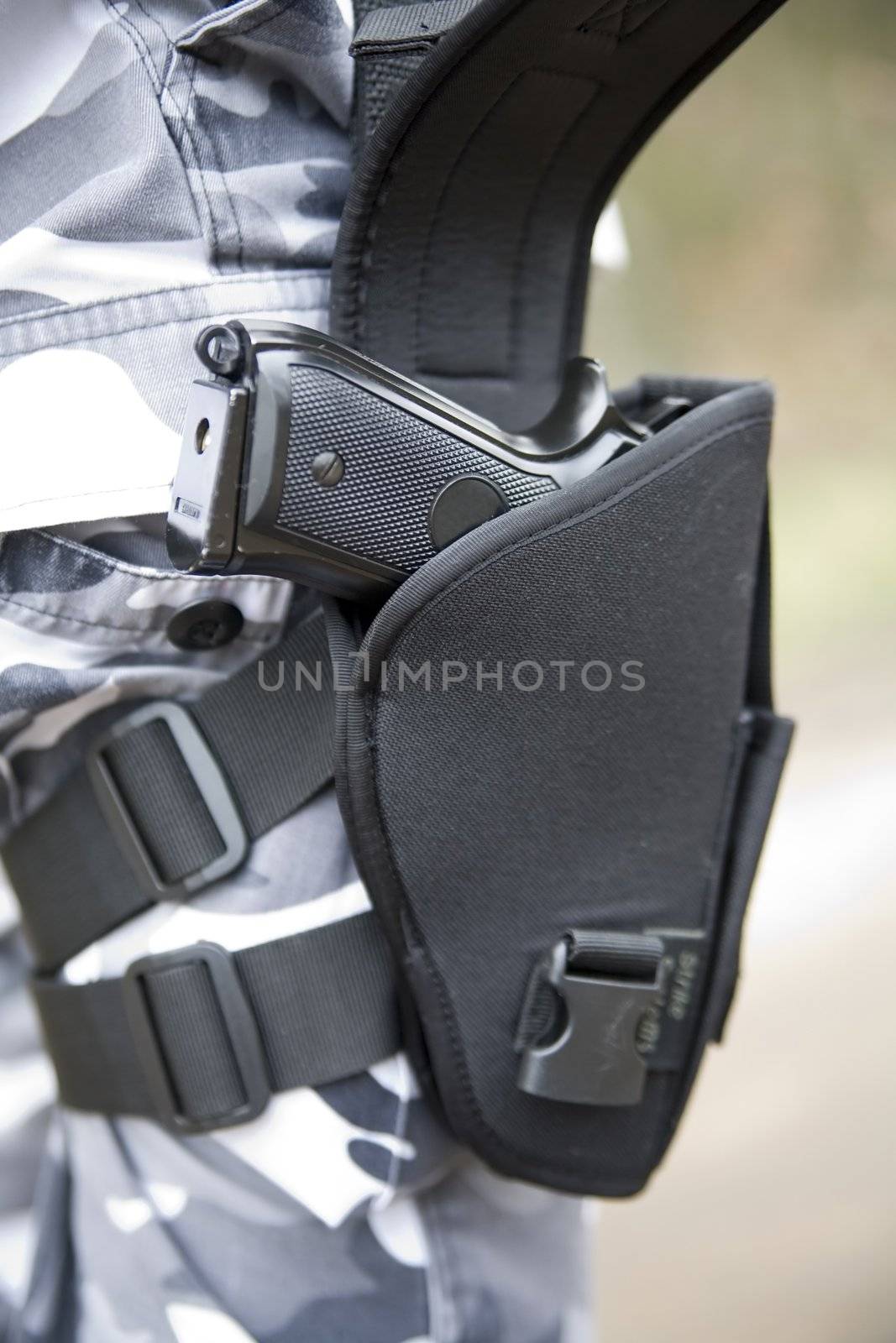 gun holster with a 9mm weapon inside
