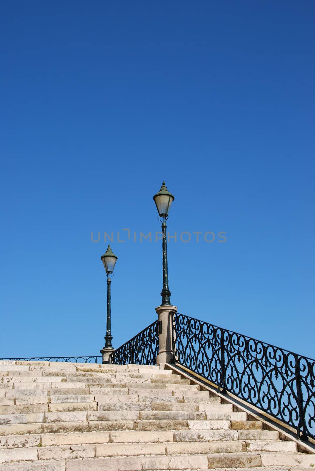 Vintage stairway with traditional lamp post (blue sky) by luissantos84