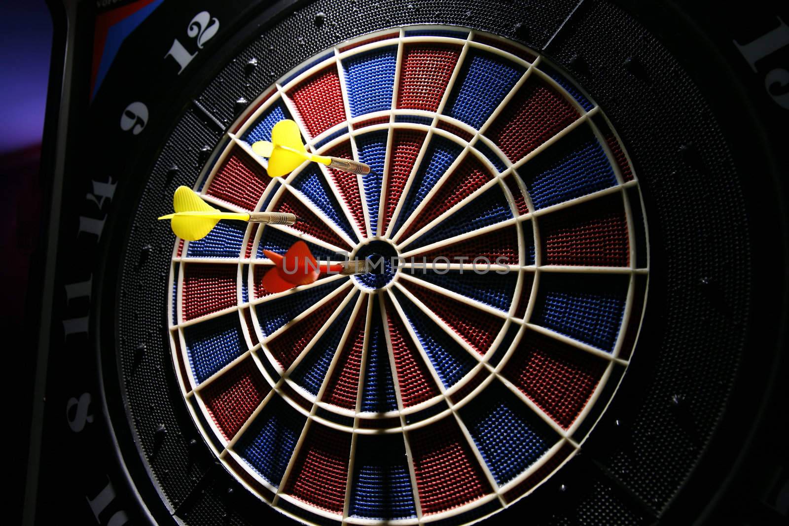 dart board with three darts by furzyk73