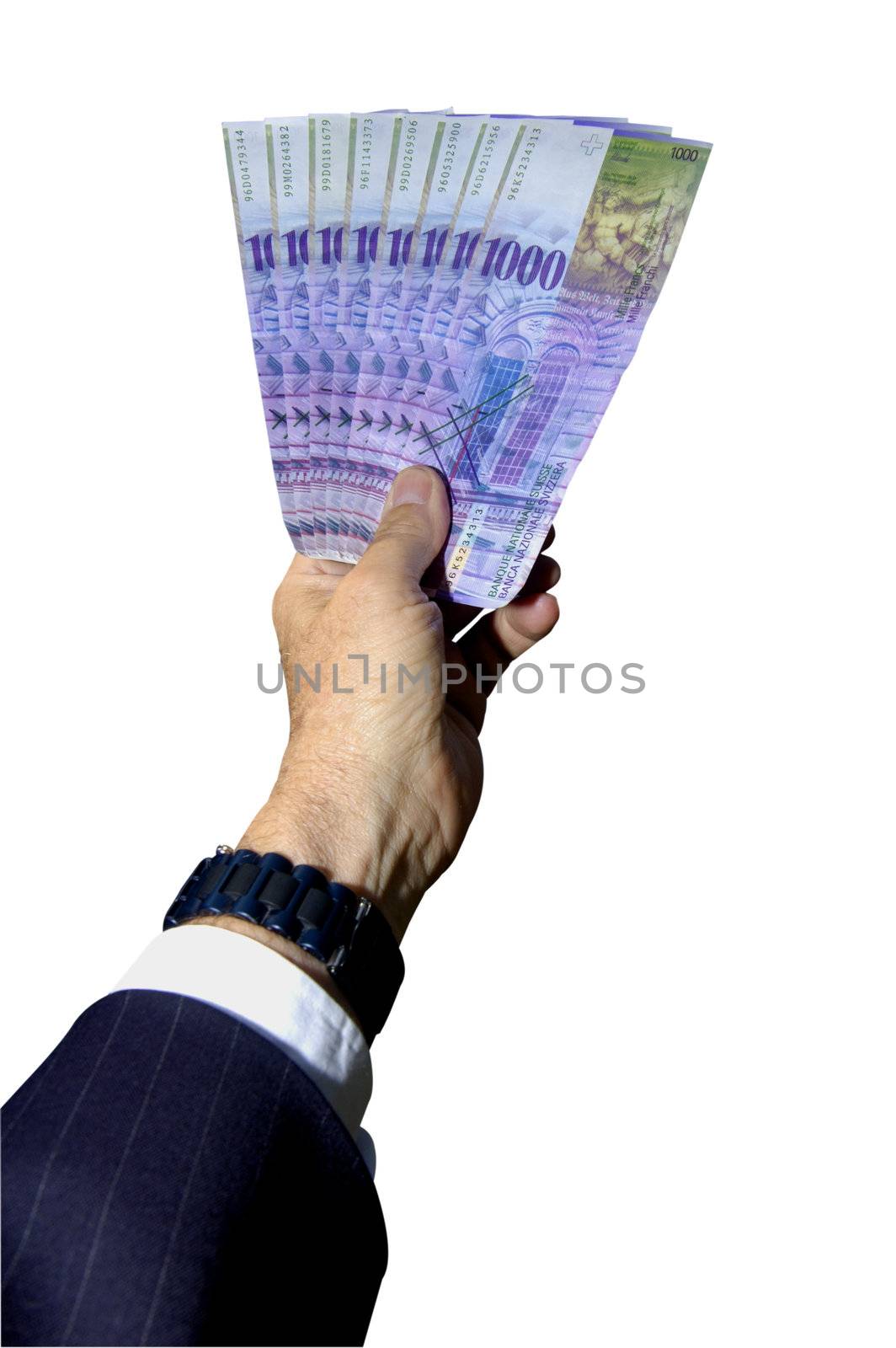 A businessman's hand, holding up 8'000 Swiss francs up high. Isolated on white, with clipping path.