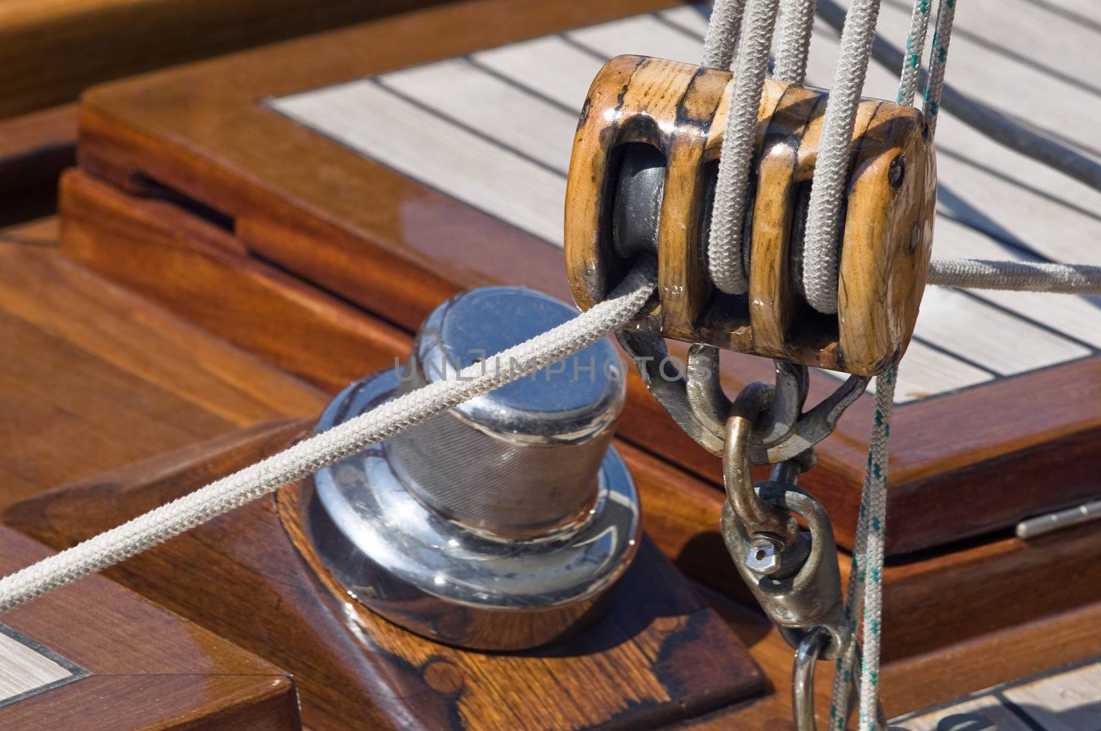 Close-up of sailing block of a wooden yacht