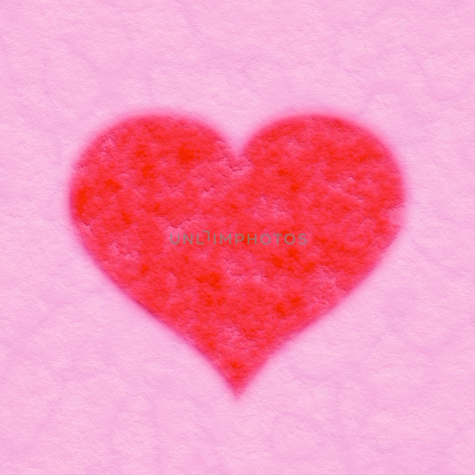 red fabric heart on pink textile background 
