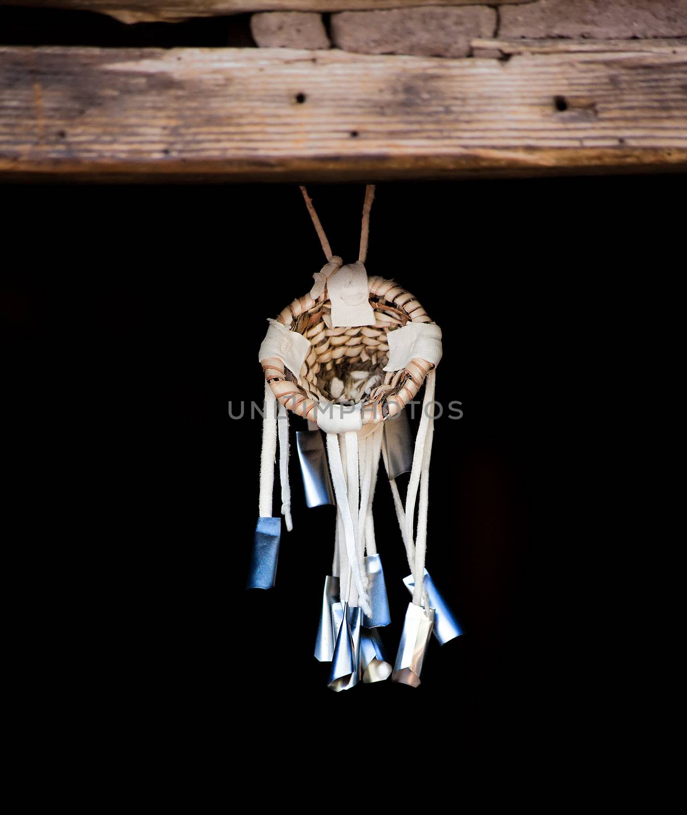 Native American Dream Catcher Suspended from Wooden Beam