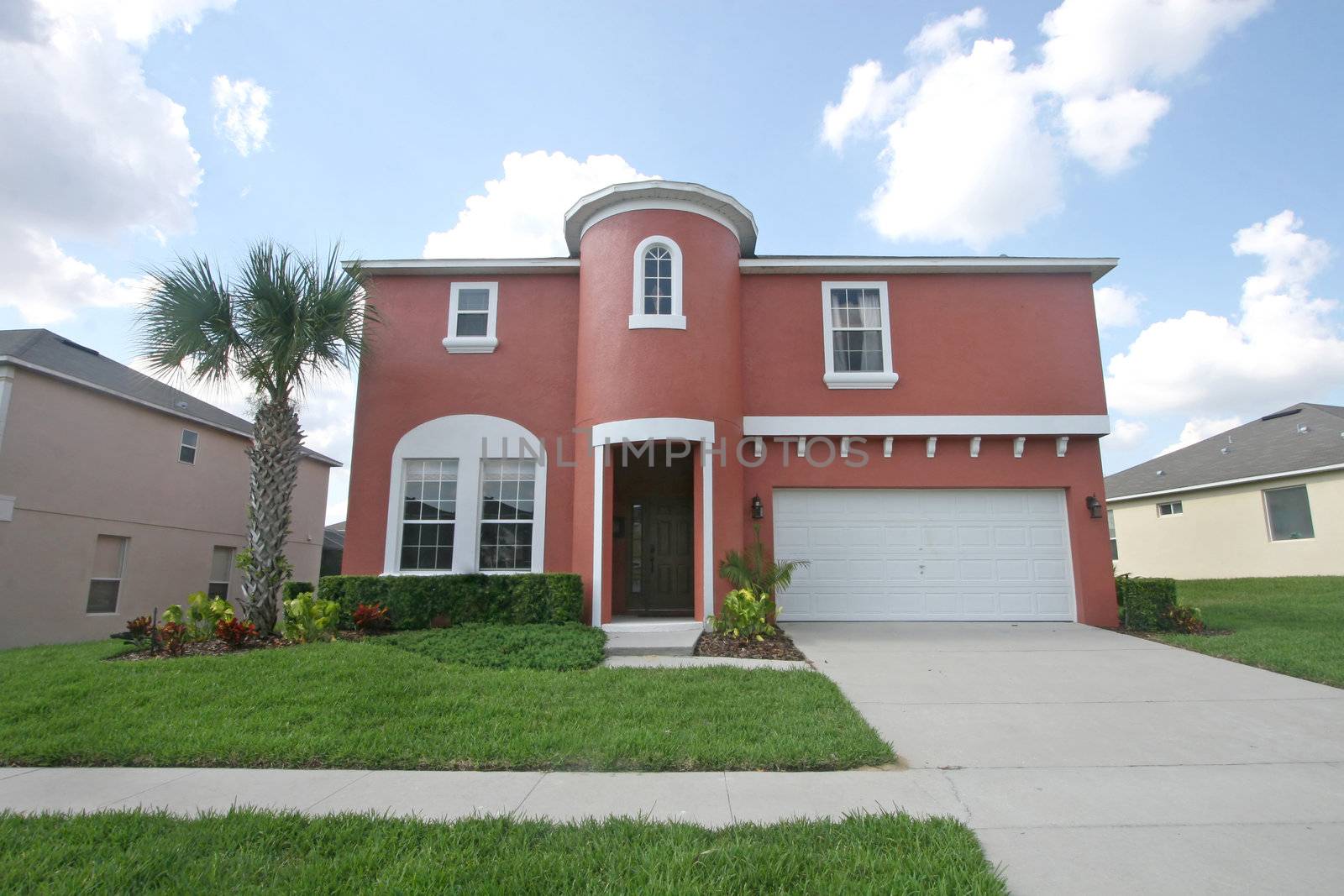 A front exterior of a large Florida home.