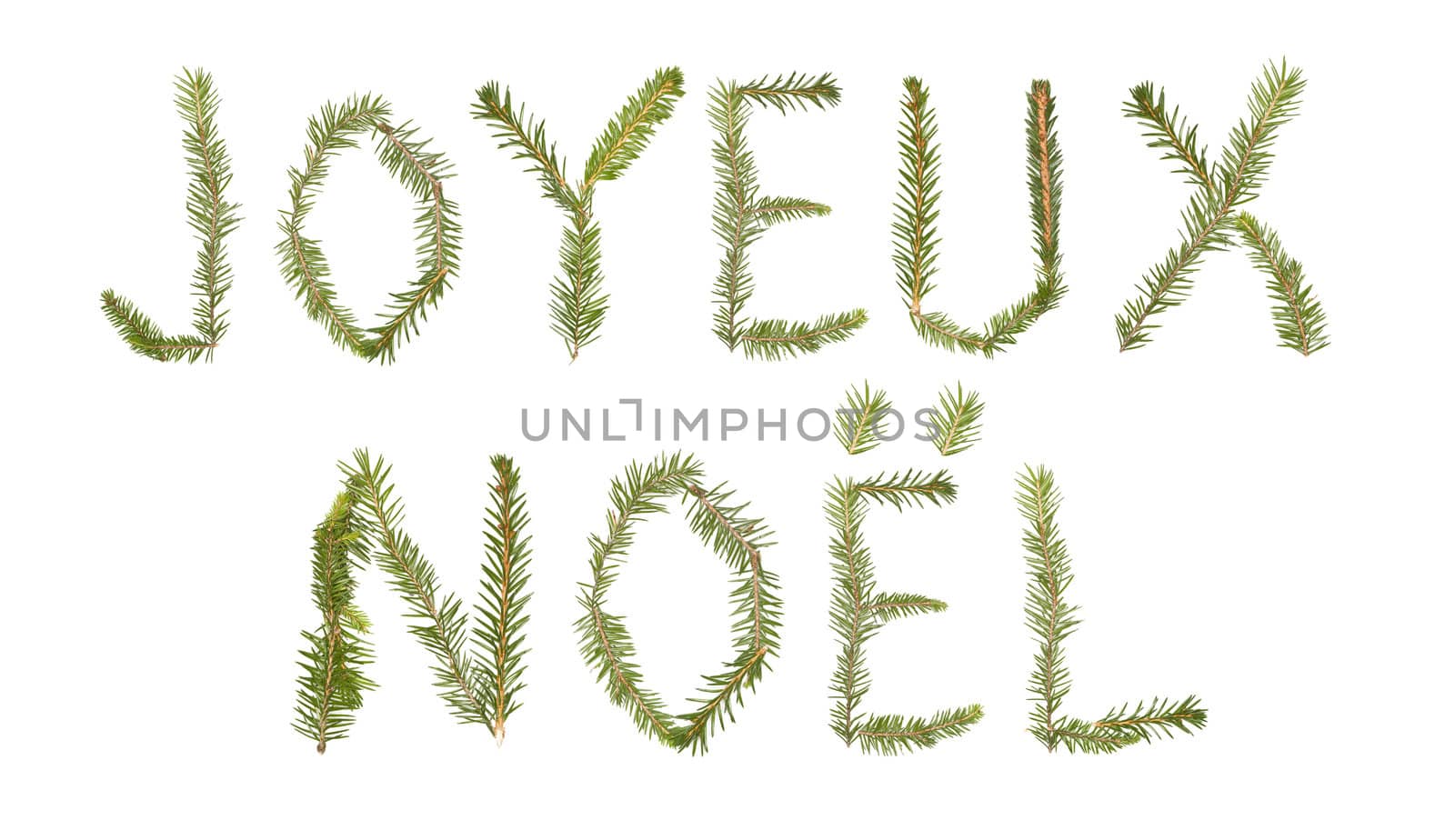 Spruce twigs forming the phrase 'Joyeux Noel'' isolated on white