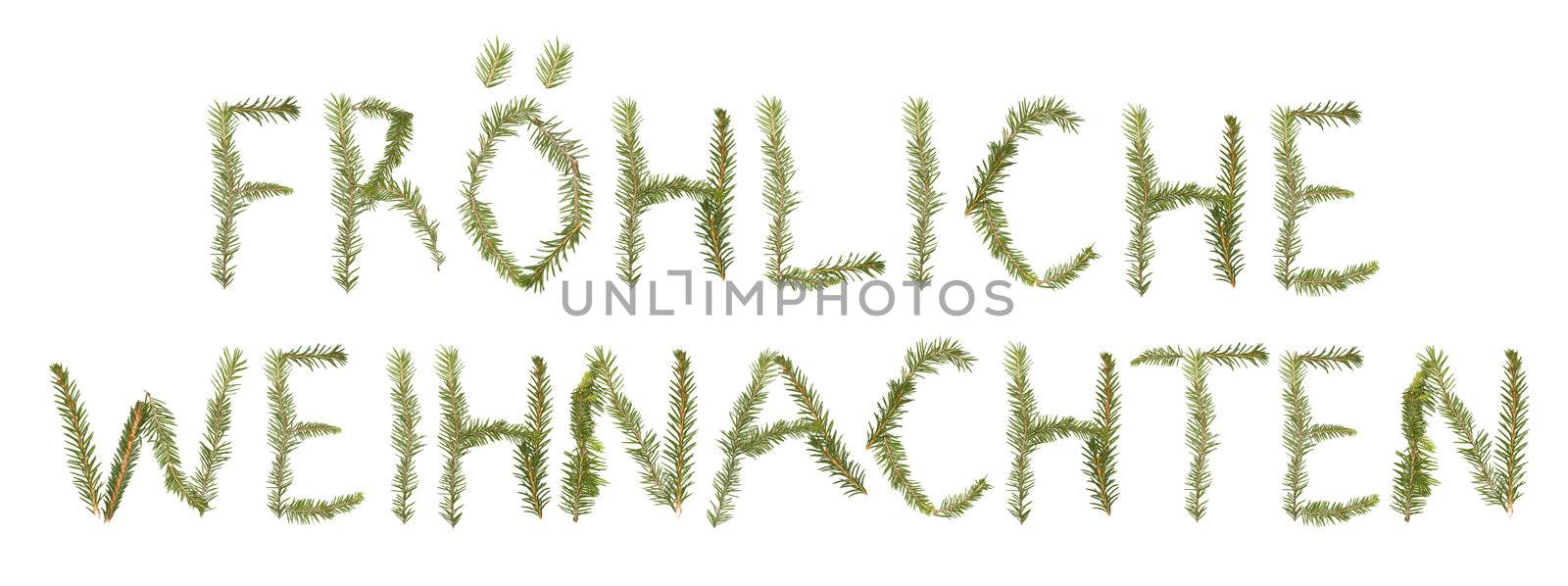 Spruce twigs forming the phrase 'Fr�hliche Weihnachten' isolated on white