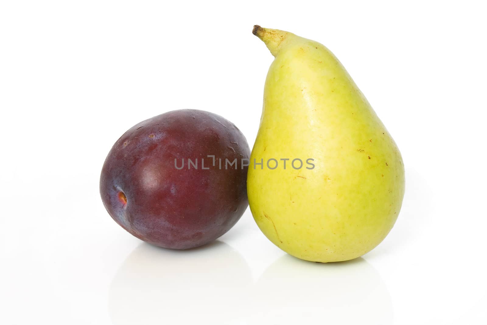 single plum and pear isolated on white background