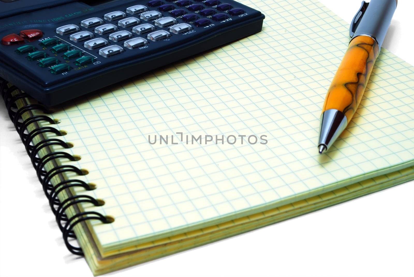 Isolated Yellow Notebook, Orange Pen and Calc on White Background