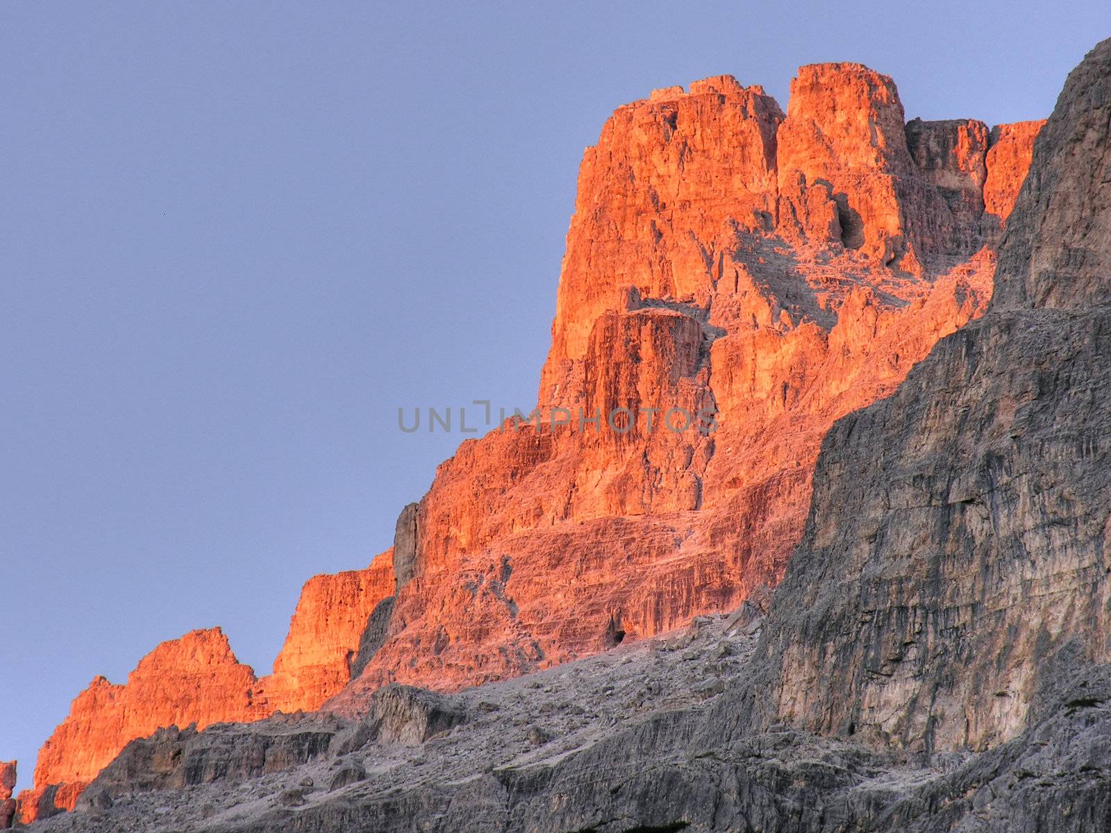Sunset on Dolomites Mountains, with the typical red and rose colours