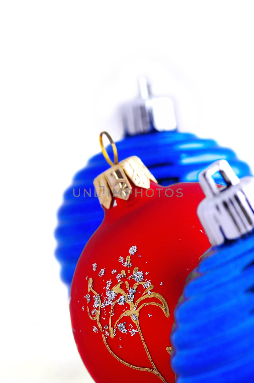blue christmas balls and one red christmas ball
