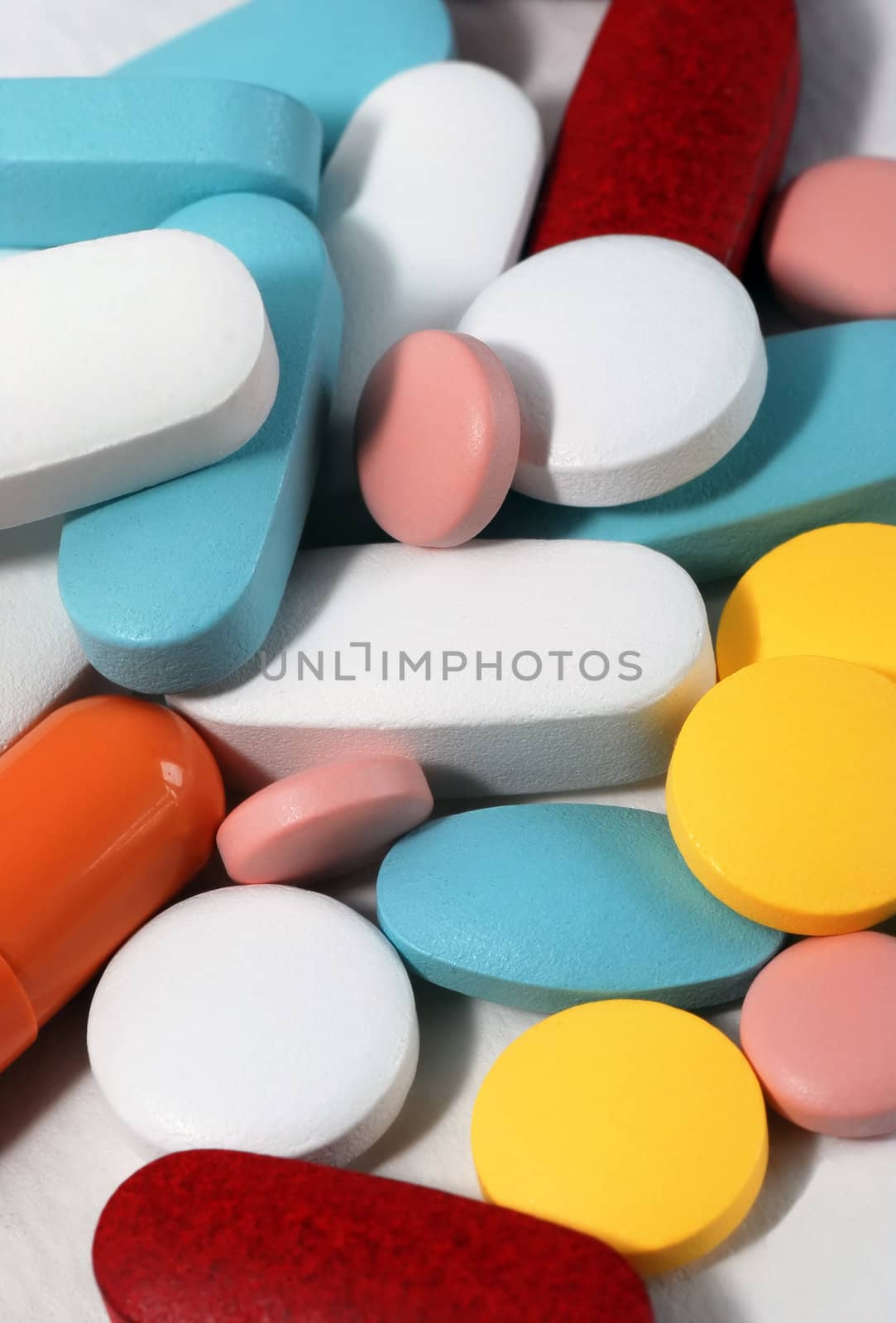 Tablets and color pills for different diseases.
