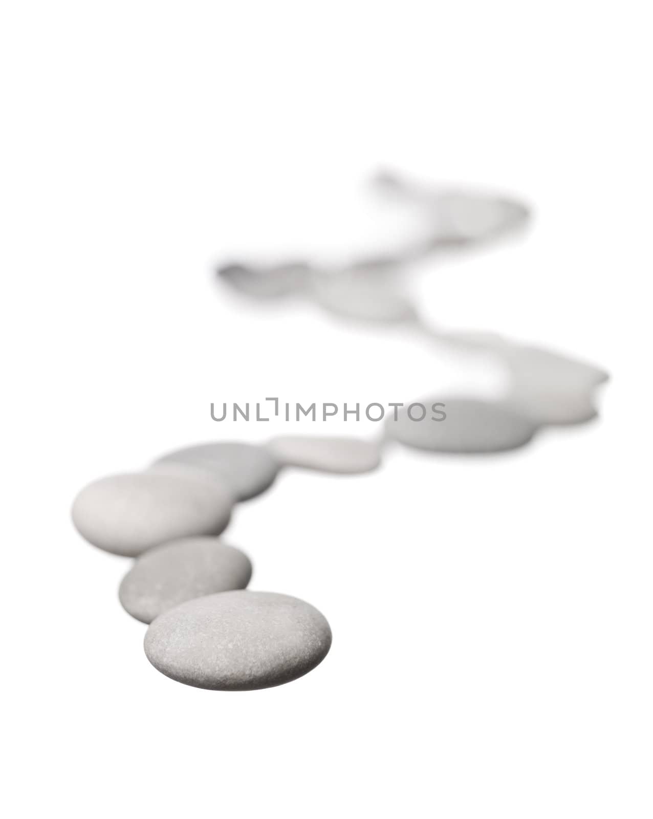 Line of stones isolated on white