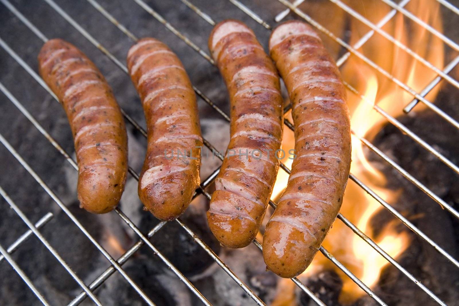 tasty sausages on the summer grill party