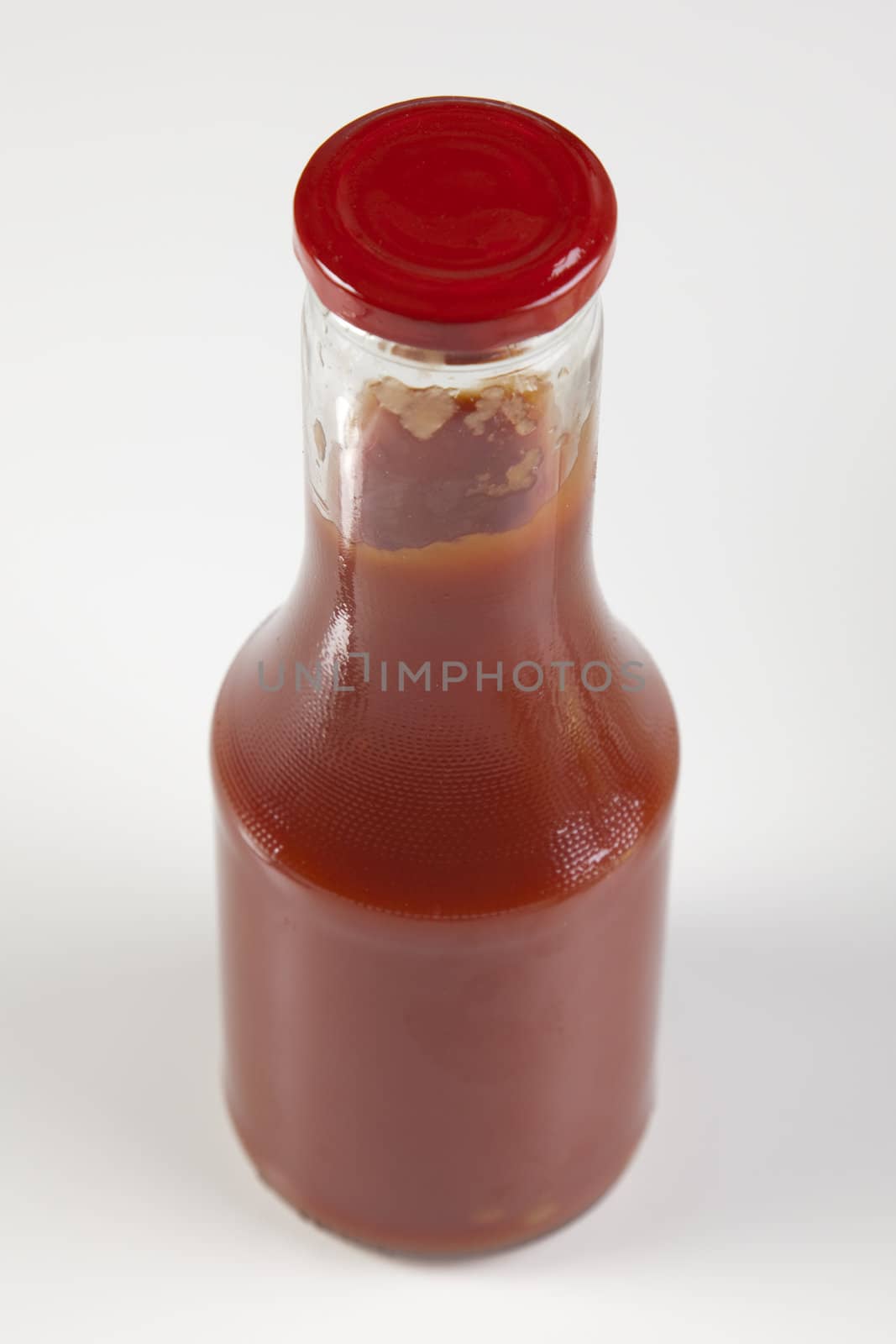 Small sause in glass on white background