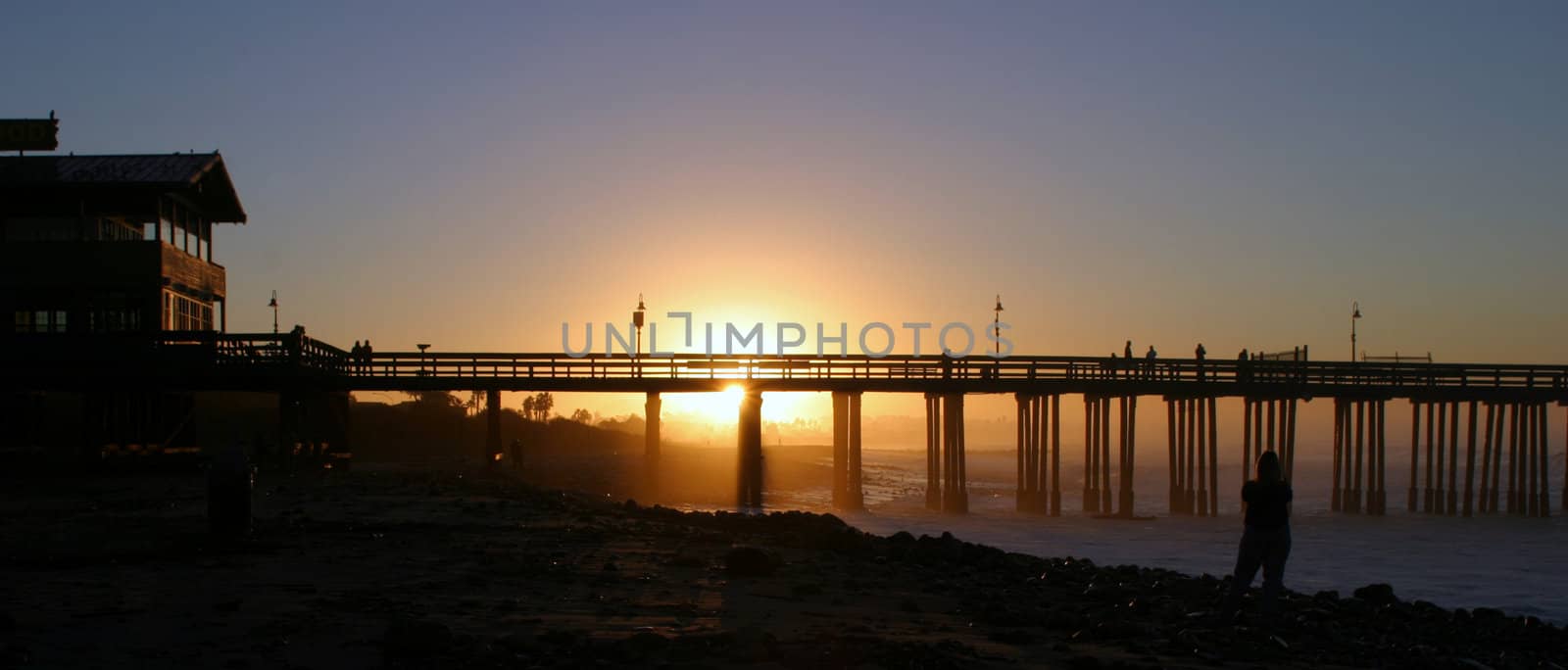 The Ventura pier at sunrise at the beach.