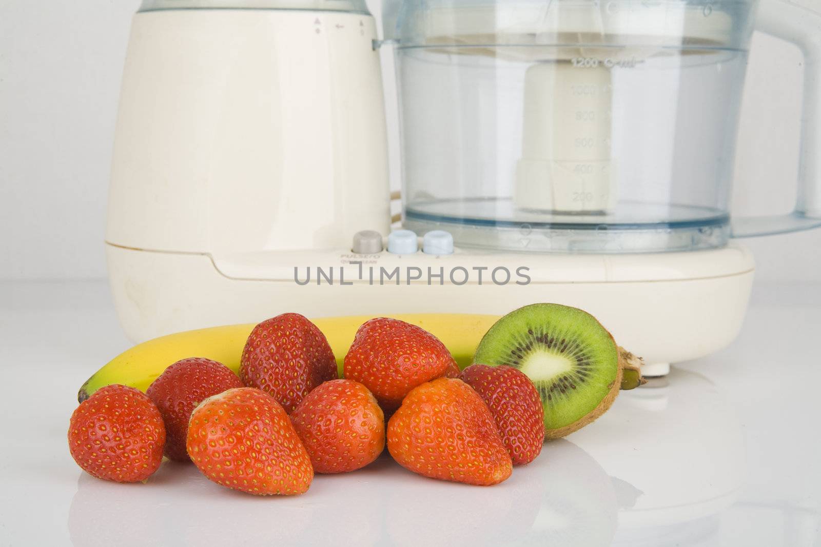 fresh fruits ready to chop in electric mixer