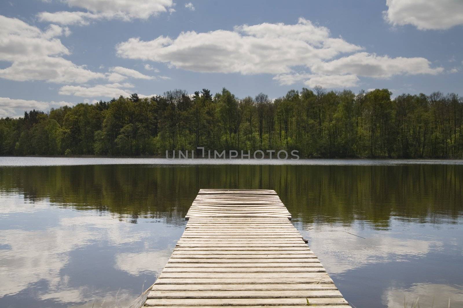 wooden pier on the lake in Poland