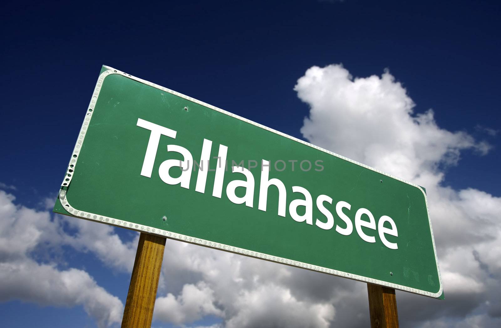Tallahassee Road Sign with dramatic blue sky and clouds - U.S. State Capitals Series.