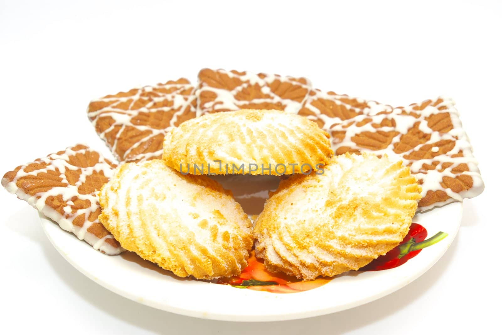 photo of the plate with cookies on white background