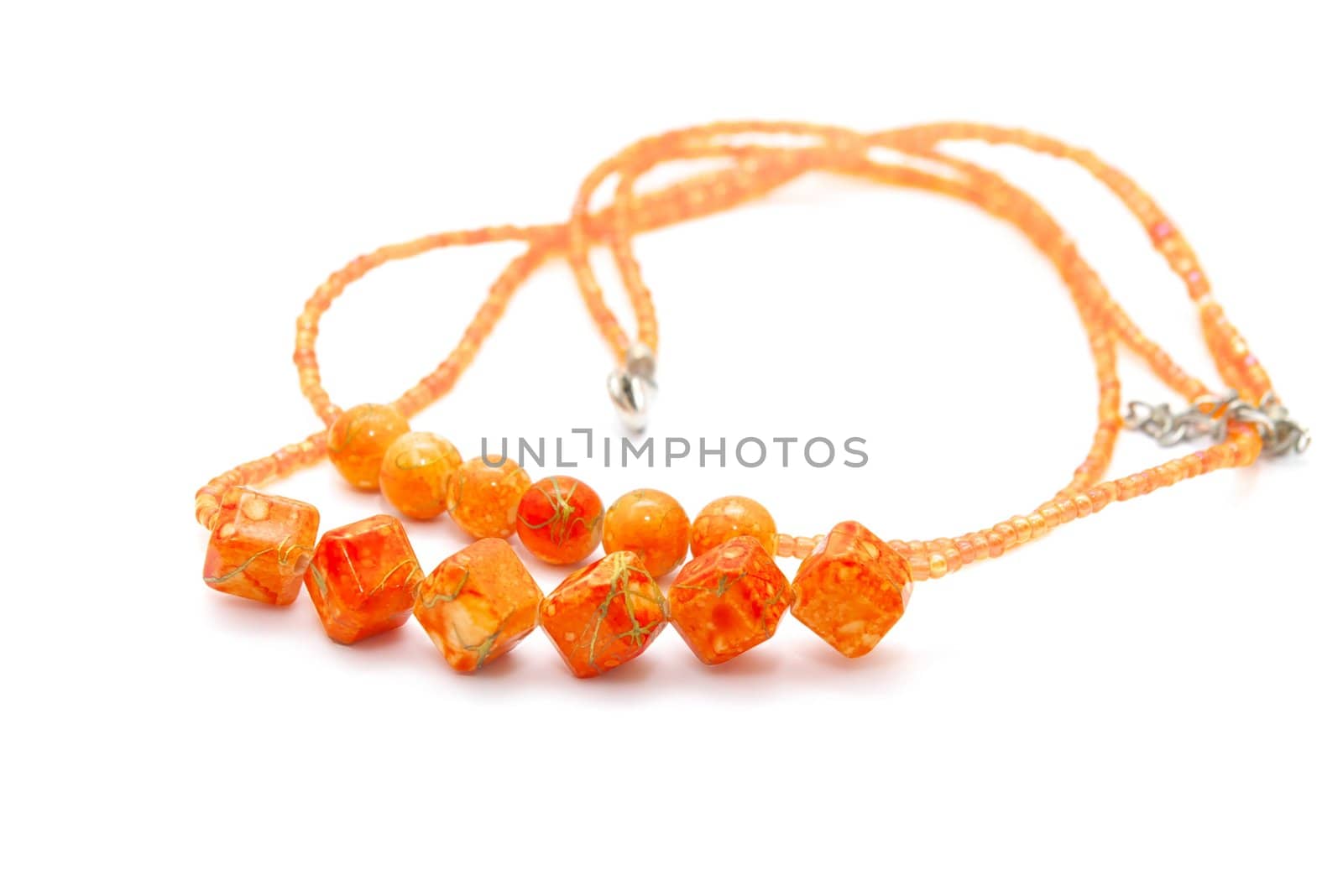 photo of the beautiful orange necklace on white background