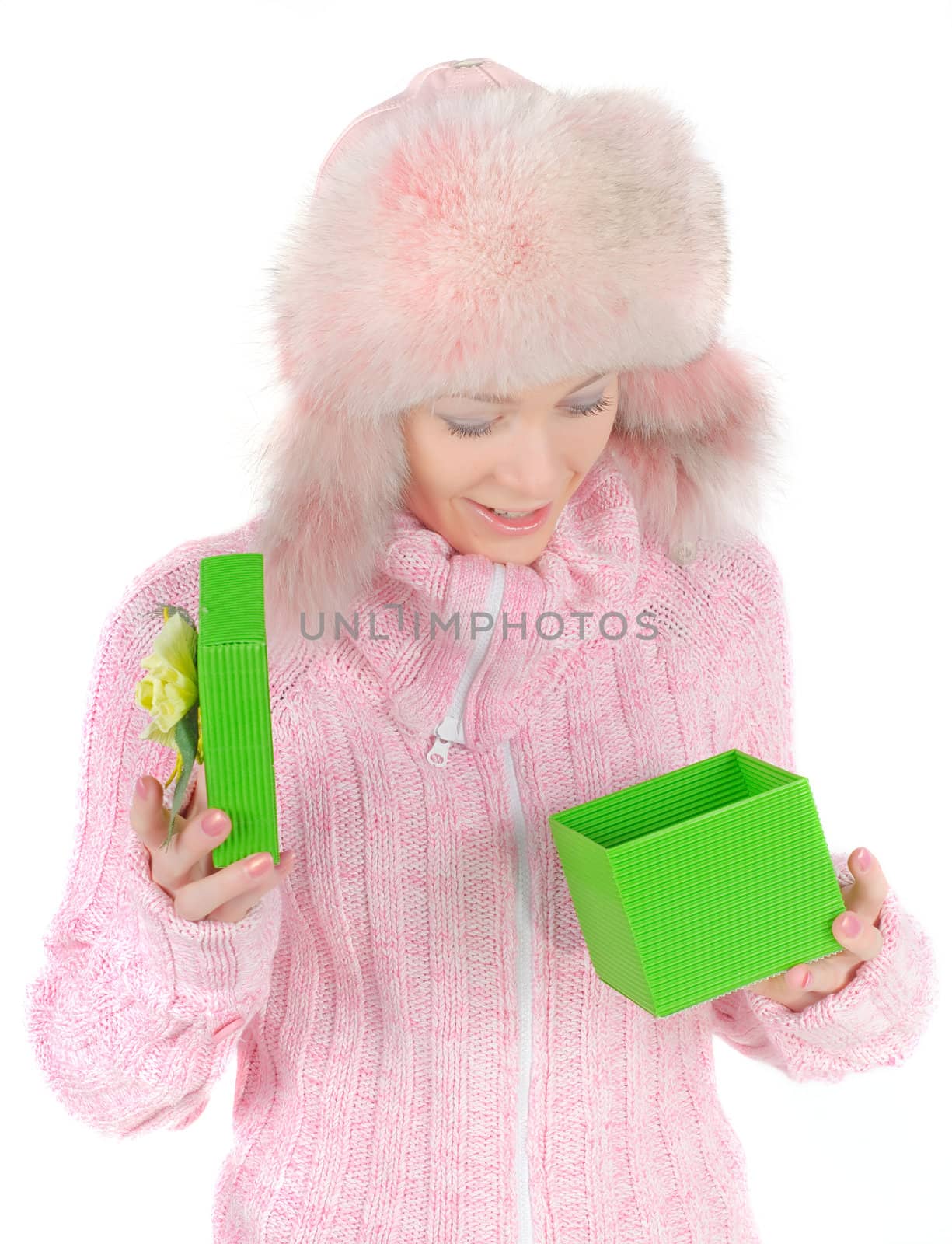 Beautiful woman in pink fur hat, isolated on white