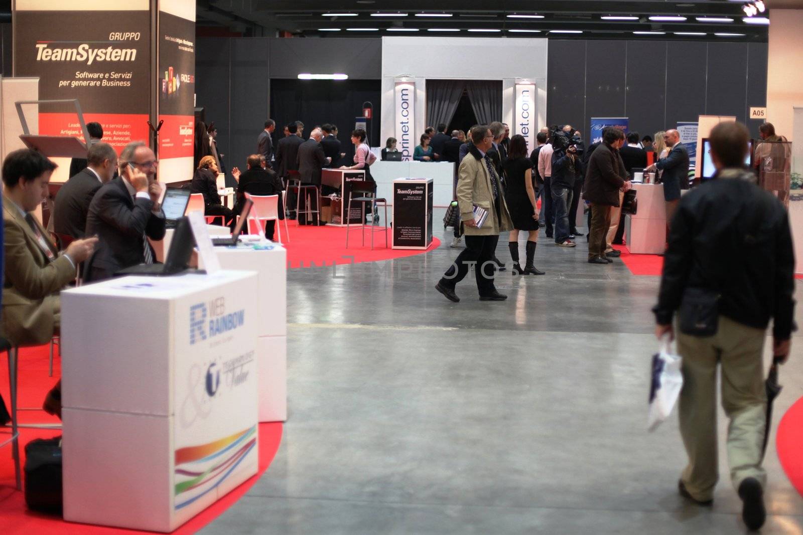 People walking trough stands at Smau, national fair of business intelligence and information technology October 21, 2009 in Milan, Italy.