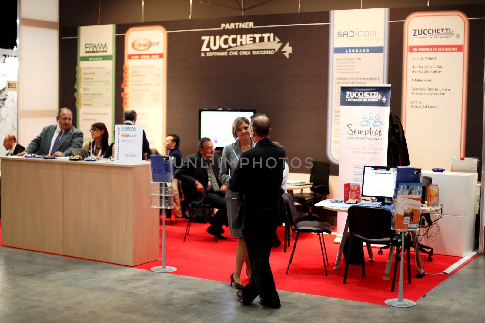 People walking trough stands at Smau, national fair of business intelligence and information technology October 21, 2009 in Milan, Italy.
