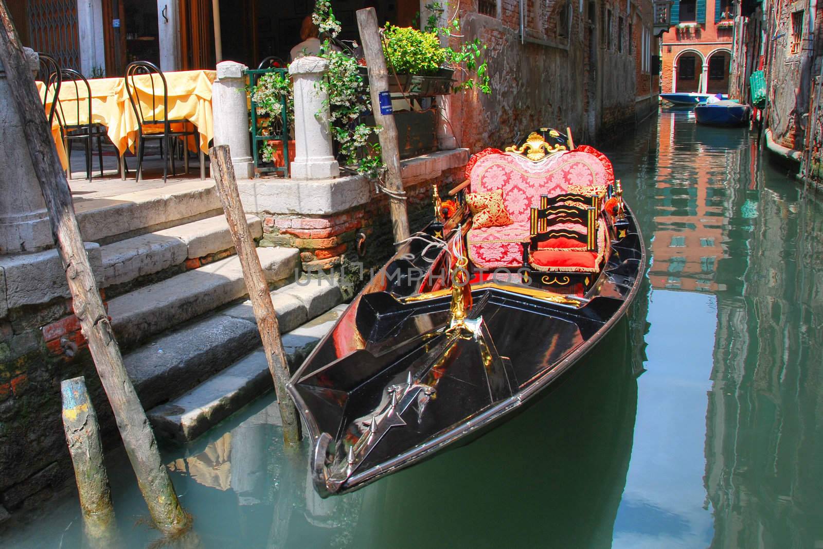 Gondola Parked in Venice on a typical canal
