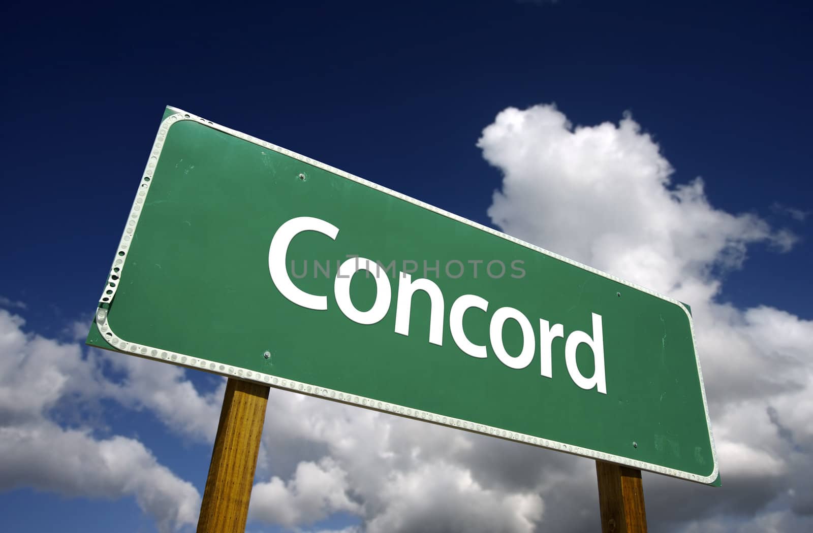 Concord Road Sign with dramatic blue sky and clouds - U.S. State Capitals Series.